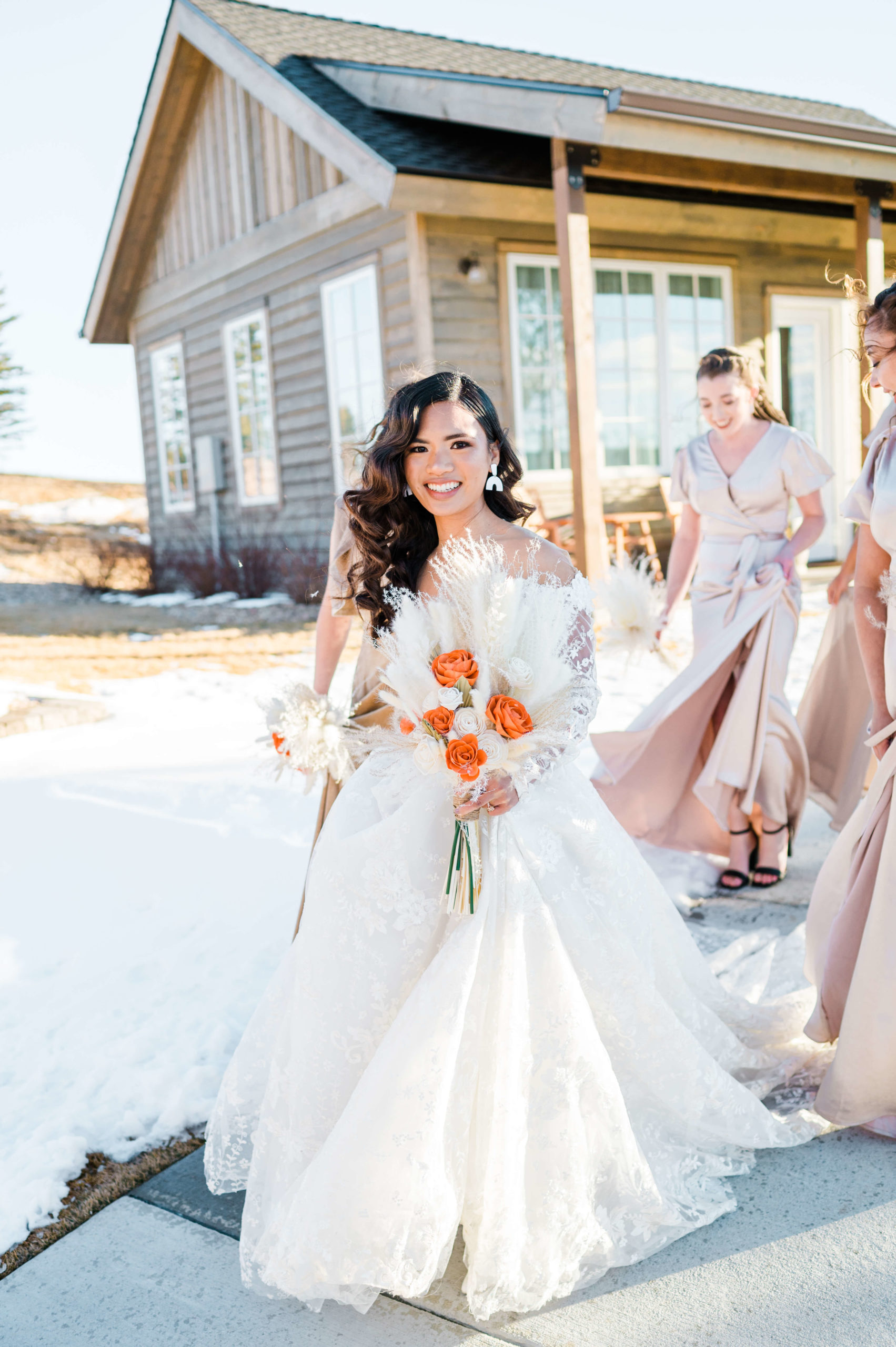 brides walking with bouquet