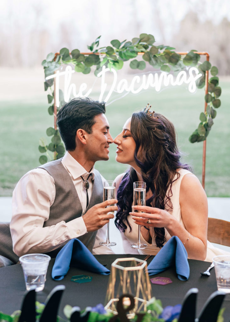 Sweet moment between bride and groom at Denver Botanic Gardens Chatfield Farm Wedding