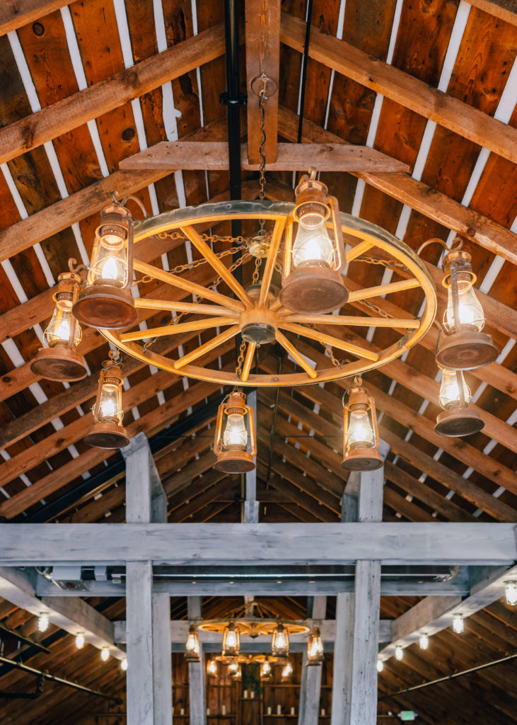 wagon wheel chandelier in the loft