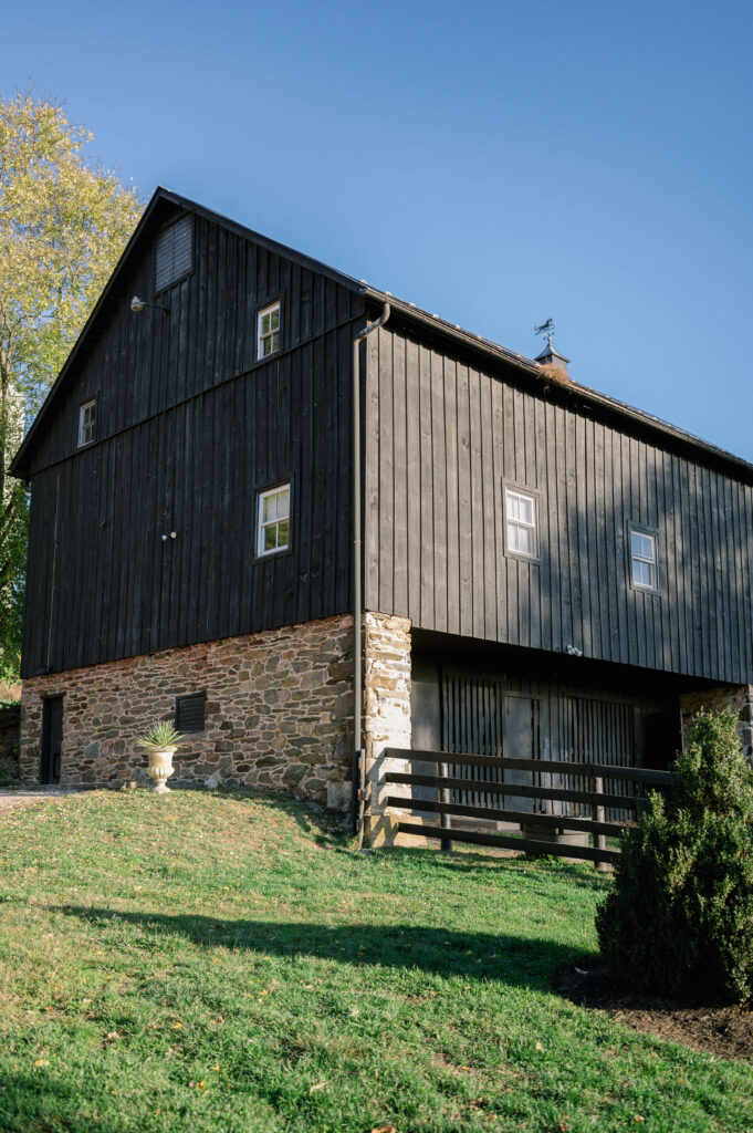 A grand vintage barn not only hosts the horses but also acts as the indoor reception hall