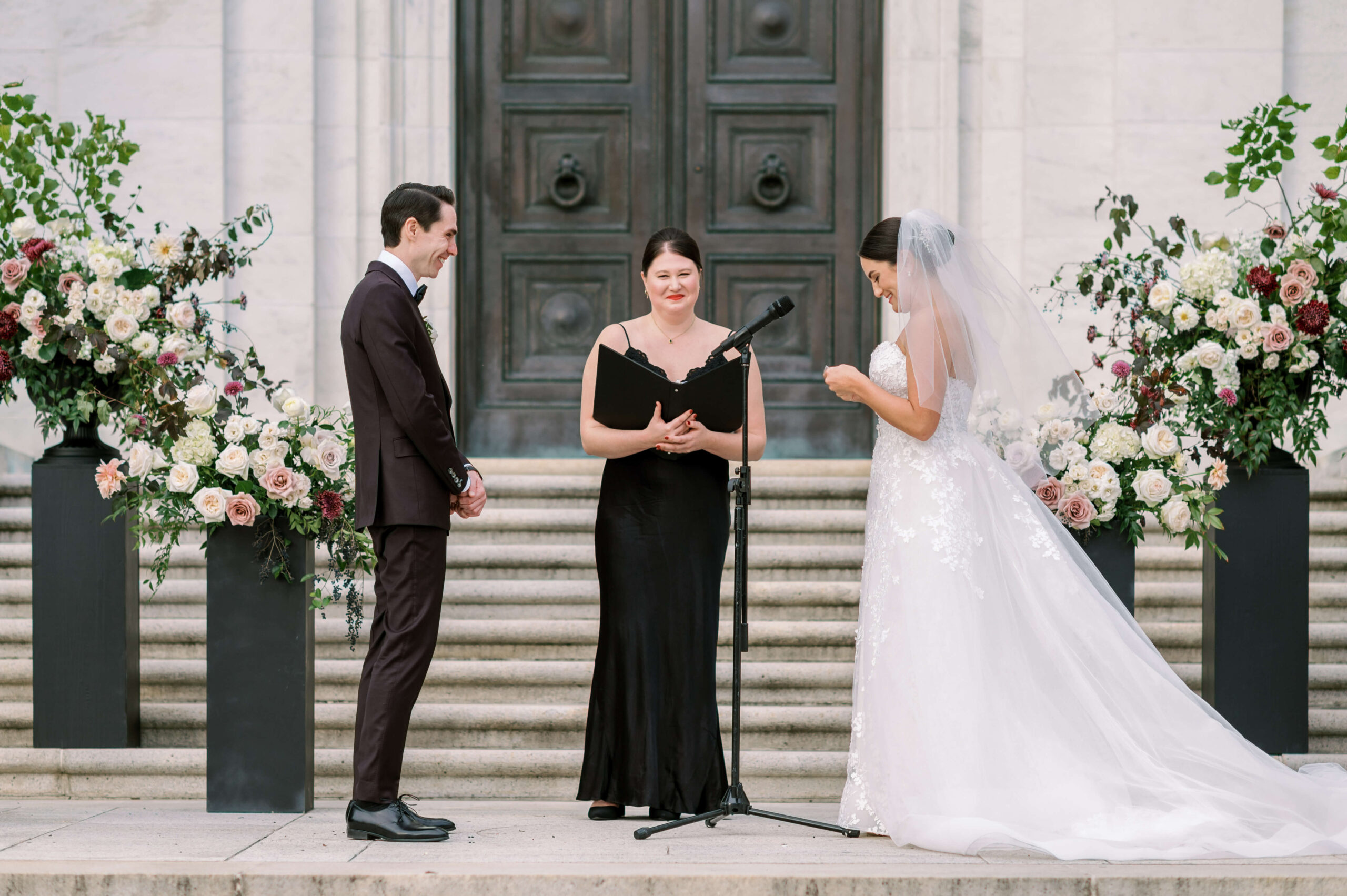 bride and groom exchange vows during their ceremony at their potomac view terrace wedding